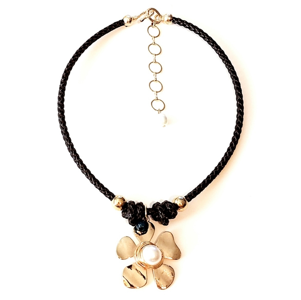 Black leather necklace w/ flower and wire wrapped pearl pendant.